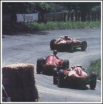 Fangio passes Collins at the Nordkurve